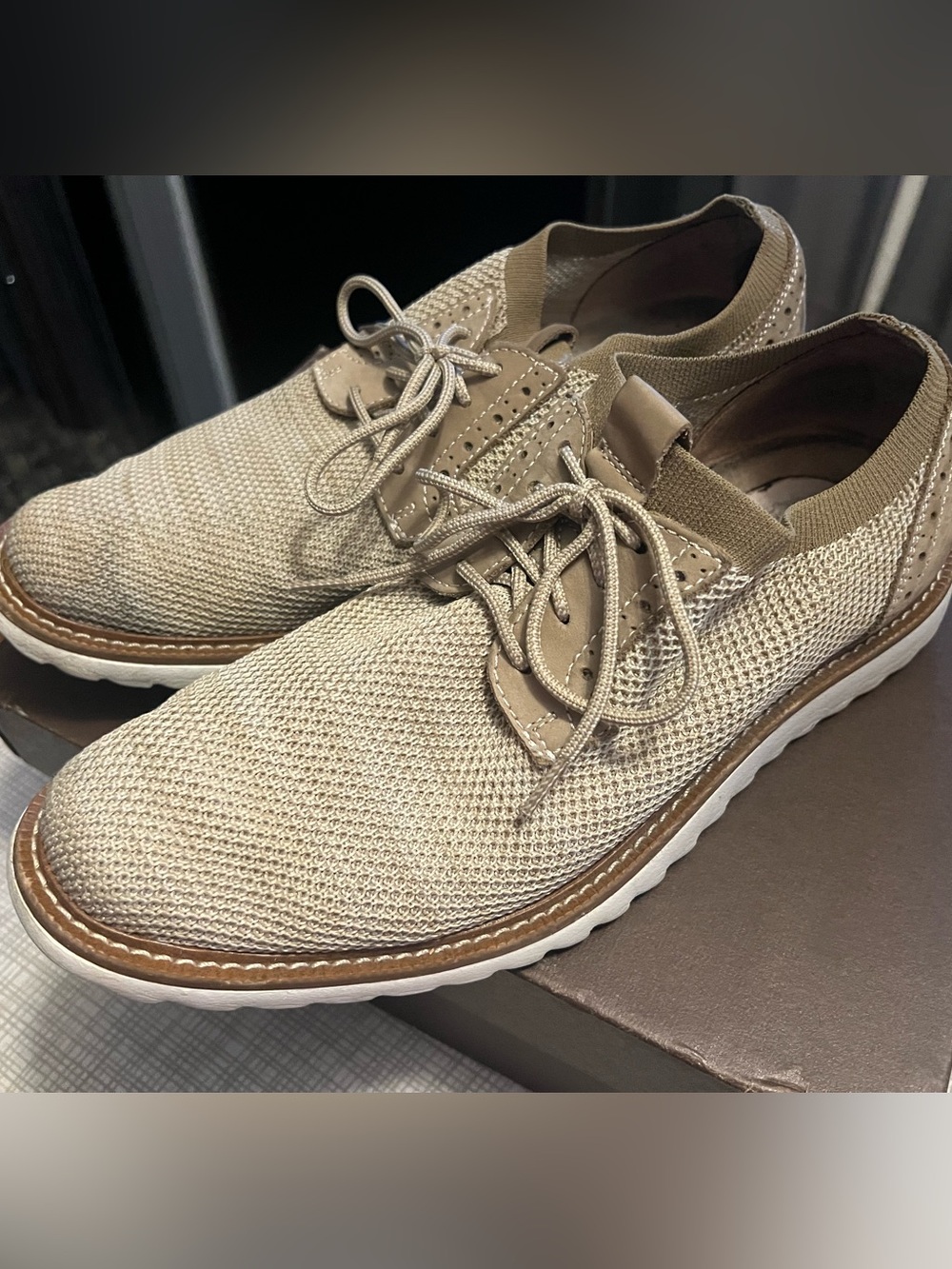 Brogue style soft sole tan dress shoes. Slip on. Mesh knit top fabric.